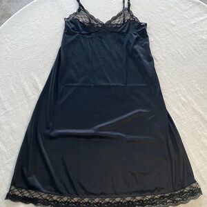 Vintage black nylon with lace full slip. Size 32 adjustable straps.